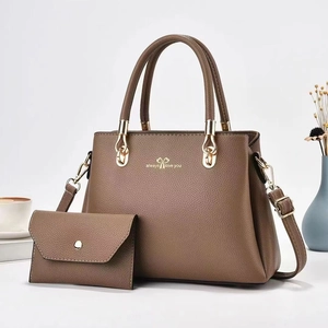Brown litchi pattern handbag and envelope clutch set with gold metal accents