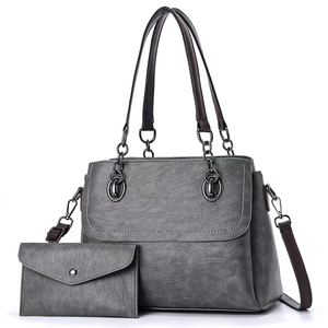 Gray textured soft leather tote bag set with matching wallet and chain strap