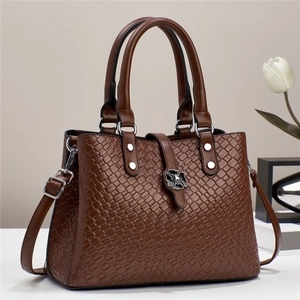 Brown woven texture tote bag with silver metallic flower lock and detachable shoulder strap