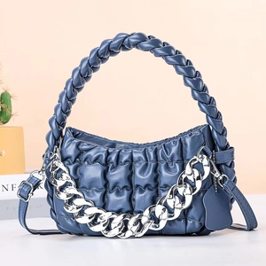 Dark blue pleated leather chain handbag with woven handle and silver hardware