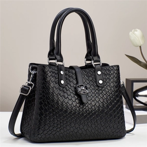 Classic black woven texture handbag with silver flower buckle and adjustable strap