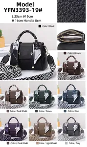 Detail showing the inner compartments, leather texture and multi-color options of this handbag