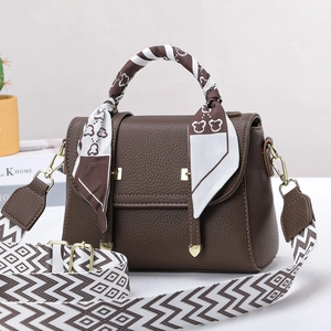 Brown litchi leather handbag with gold buckle and decorative floral handle scarf