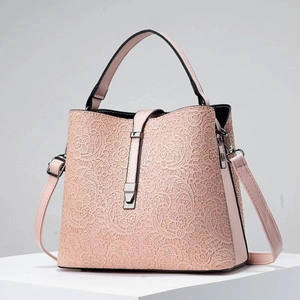 Pink lace bucket bag with metal clasp and top handle for women's crossbody wear