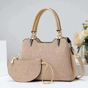 Detailed macro view of beige lace patterns and texture on this elegant handbag set