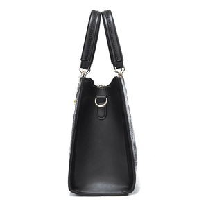 Classic black PU leather tote bag with gold D-rings and sturdy handles on white background