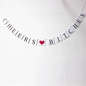 White Cheers Bitches bridal shower banner with red heart for bachelorette party decor