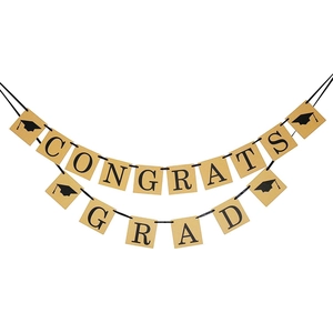 Congrats Grad burlap graduation banner with black tassels and academic cap icons