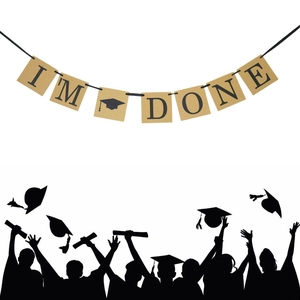 Kraft paper graduation banner with I'M DONE text and mortarboard icons for party decor