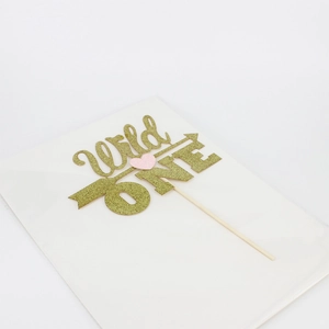 Golden glitter Wild One cake topper with pink heart for first birthday party decorations