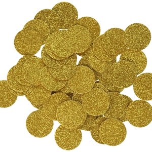 Sparkling gold round confetti circles for party table decoration and DIY crafts