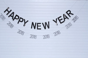 Glittery Happy New Year banner with 2018 numbers for festive party wall decoration
