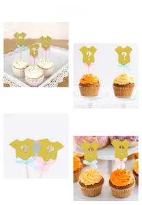Close-up of glittery baby onesie cupcake toppers with question mark and colorful bows
