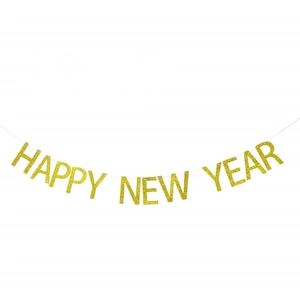 Glittery gold Happy New Year banner decoration for New Year party celebration events