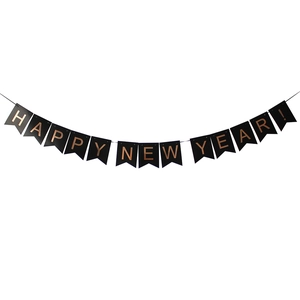 Detail of Happy New Year gold foil bunting banner for festive party scene decoration