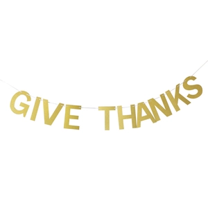 Detail of Give Thanks glitter banner for Thanksgiving party festive home wall decoration