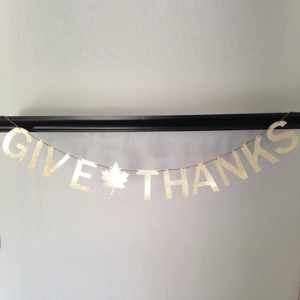 Golden glitter Give Thanks banner with maple leaf for Thanksgiving party decorations