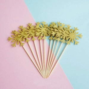 Set of 10 gold glitter snowflake cupcake toppers for Christmas party cake decoration