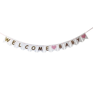 Πανό Welcome Baby για baby shower με ροζ κορδέλα και χρυσά γράμματα σε λευκές σημαίες
