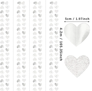 Detail of silver heart paper garland showing glitter texture and 5cm dimensions