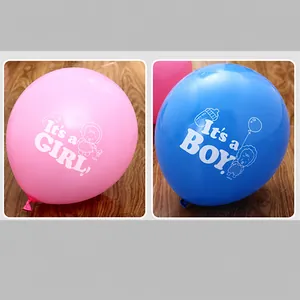 Detail of pink and blue latex balloons with It's a Boy and It's a Girl printed text