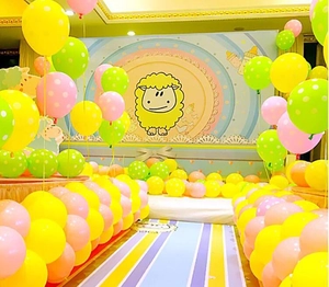 Pink and yellow balloon arch kit with cute sheep backdrop for baby shower decoration