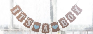 Detail of kraft paper It's A Boy banner with blue hearts for baby shower decoration