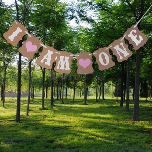 Detail of I AM ONE banner with pink heart and white bone on scallop kraft cards
