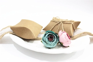 Brown kraft paper pillow candy gift box with natural hemp rope and lace ribbon decoration