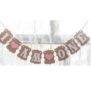 I AM ONE birthday banner with kraft paper cards and pink hearts for 1st party decor