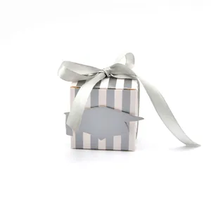 Square graduation gift box with silver vertical stripes and academic cap ribbon detail