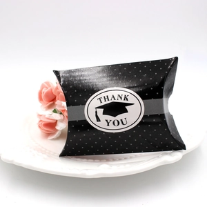Creative graduation cap candy box with white polka dots and Thank You sticker decoration