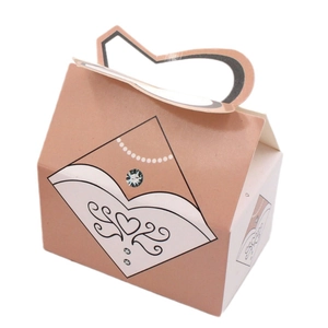 Elegant European-style wedding favor box with hollow heart handle and bridal dress pattern