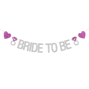 Silver glitter Bride To Be banner with pink hearts and diamond rings for wedding decor