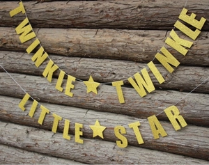 Detailaufnahme der Twinkle Twinkle Little Star Girlande mit Goldglitzer für Partys