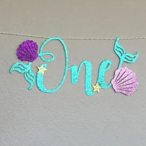 Mermaid theme 1st birthday banner with glitter One letters shells and starfish