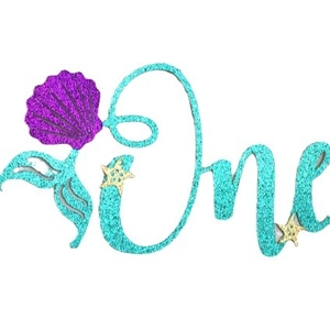Mermaid themed first birthday banner with glitter one text and starfish decorations