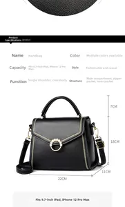 Close-up of black leather bag grain with pearl ring clasp and dimension guide