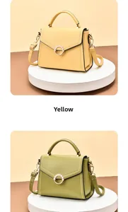 Detail of fashion tote bag with pearl metal buckle and detachable strap in yellow and green