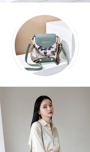 Green mini crossbody bag with husky print and silk scarf handle detail worn by model