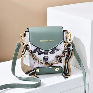 Green and white crossbody phone bag with husky dog pattern and silk scarf handle
