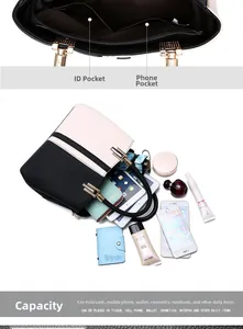 Detail view of large capacity handbag interior with compartments for phone and wallet