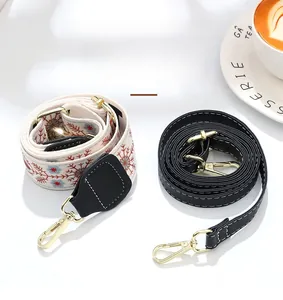 Détail de deux styles de bandoulières, dont le tissu vintage et le cuir noir élégant