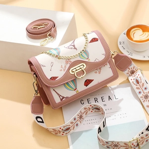 Chic cream mini square bag with Eiffel Tower print and colorful embroidery straps