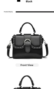 Detailed front view of black glossy leather handbag with silver horseshoe buckle and chain