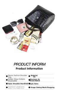 Top view of black crocodile pattern bucket bag showing large capacity and dimensions