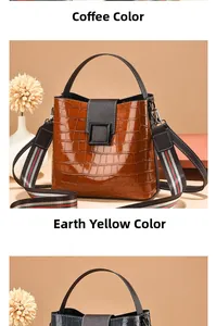 Close-up of patent leather bucket bag with crocodile texture and striped strap