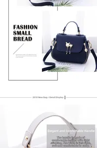 Detail of lychee pattern leather handbag with pearl cat clasp and dual tassels