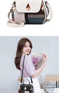 Detail of multi-color geometric patterned crossbody bag with elegant gold teardrop clasp