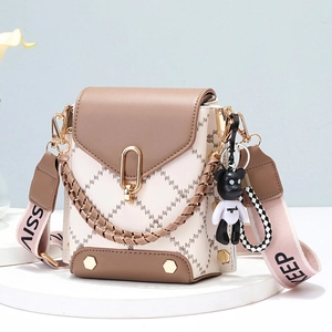 Chic quilted mini crossbody phone bag with embroidered details and bear charm
